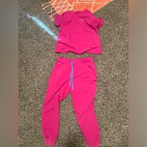 Figs scrubs set in raspberry. One pocket top and Zamora joggers